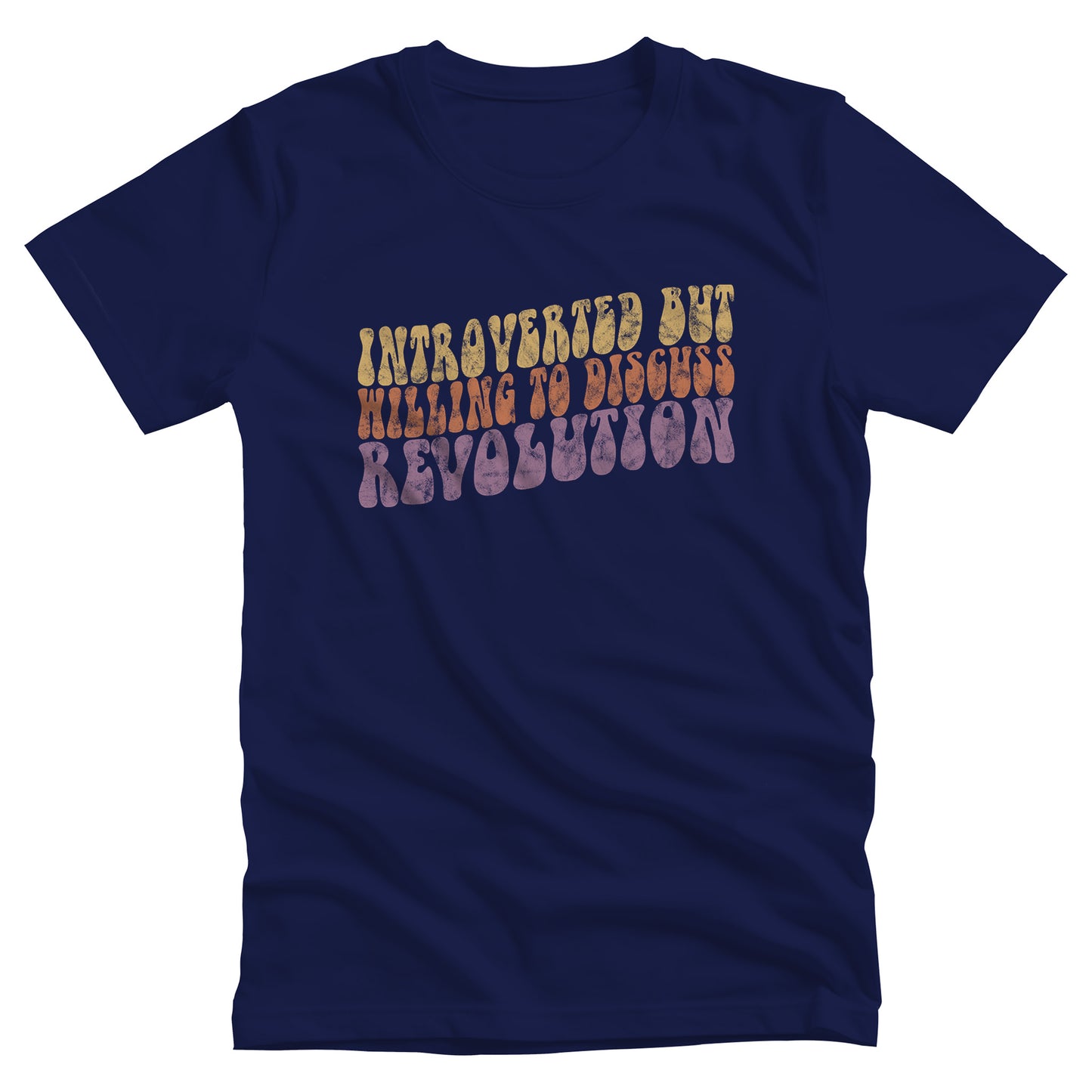 Navy Blue unisex t-shirt with a vintage graphic on it that looks worn and grungy. The graphic says “Introverted but willing to discuss revolution” in a retro font in all caps. Each line is a different color: “Introverted but” is a retro yellow, “willing to discuss” is a retro red, and “Revolution” is a retro purple. The graphic is a wavy shape and slopes upwards to the right.