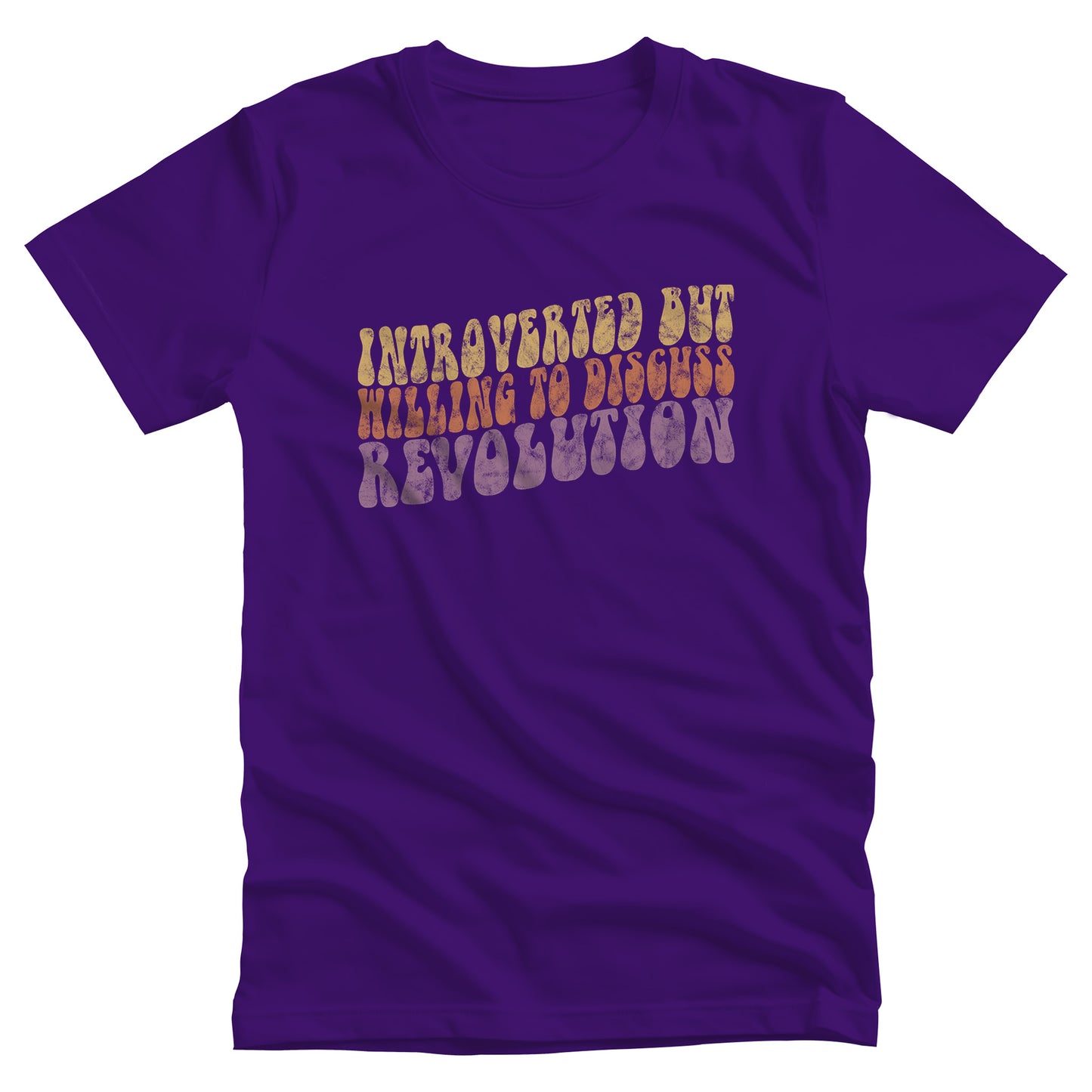 Team Purple color unisex t-shirt with a vintage graphic on it that looks worn and grungy. The graphic says “Introverted but willing to discuss revolution” in a retro font in all caps. Each line is a different color: “Introverted but” is a retro yellow, “willing to discuss” is a retro red, and “Revolution” is a retro purple. The graphic is a wavy shape and slopes upwards to the right.