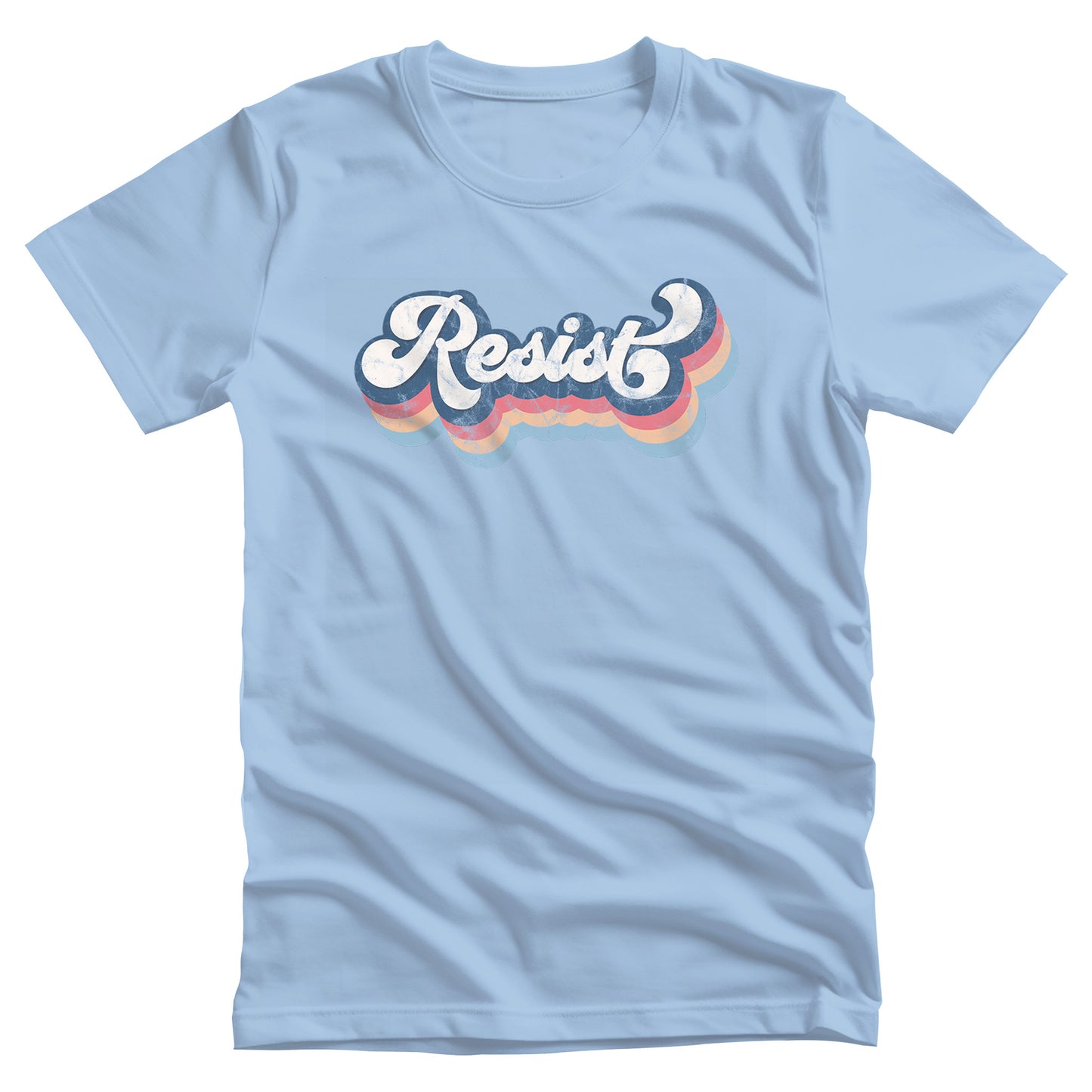 Baby Blue color unisex t-shirt that says, “Resist” in a script font and thickly outlined with four colors which have been shifted downward to give it a retro feel. The colors are dark blue, dark pink, and beige. (There is also a light blue outline but it isn’t noticeable since it’s the same color as the shirt.)