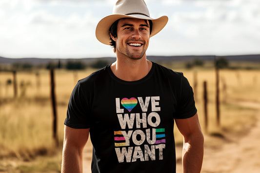 A man in a cowboy hat wearing a shirt that says, "Love who you want."