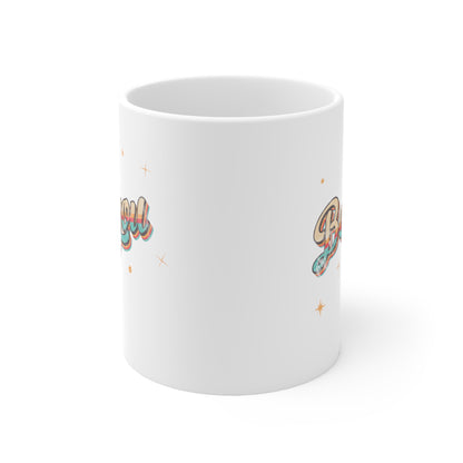 11oz white ceramic mug that says “Be you” in a vintage-inspired script font with vintage colors and stripes. It’s designed to look as if small parts of the design are coming off of the mug. This is a view that shows only a partial design.