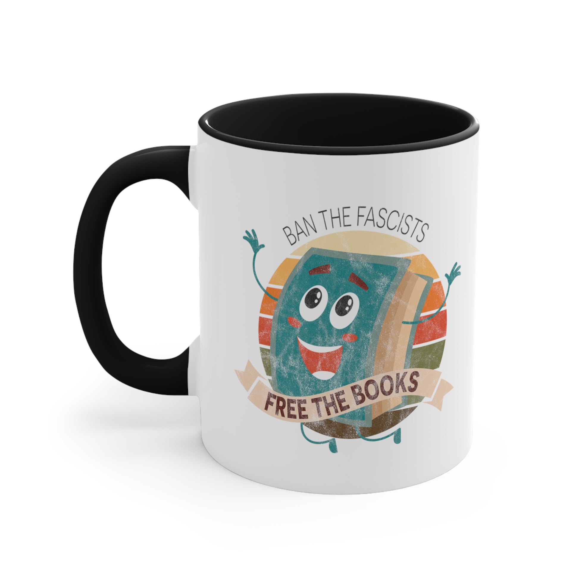 Mug with a black handle and interior with a graphic that says “Ban the Fascists, Free the Books” with a vintage illustration of a cartoon book leaping for joy. There is a circle of vintage-colored stripes behind it. 