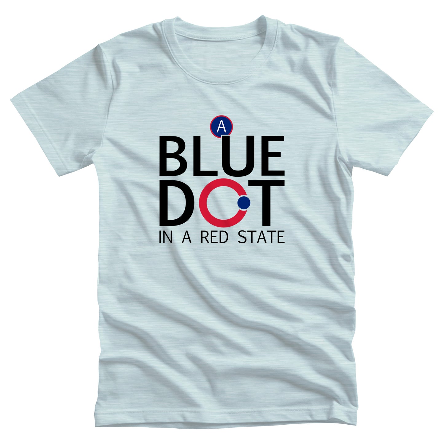 Heather Ice Blue color unisex t-shirt that says, “A Blue Dot in a Red State” in all caps. “A Blue Dot” are all on their own line, and “A Red State” is on its own line. The “O” in “Dot” is red with a small blue dot on the outer edge