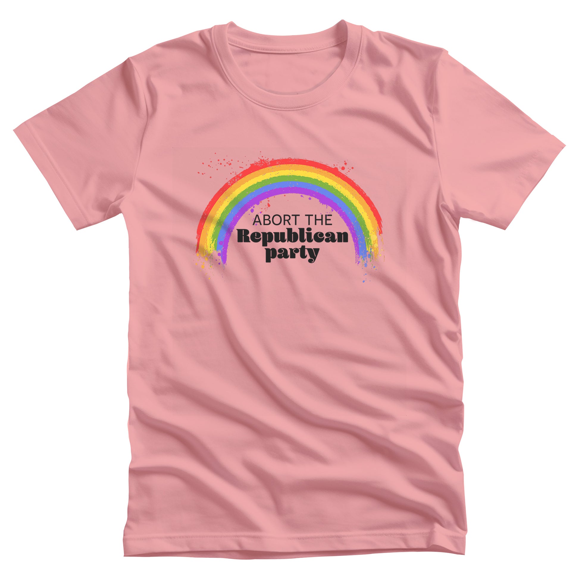 Pink unisex t-shirt with a graphic of a rainbow with small paint splatters around it. Inside the negative space of the rainbow is the text, “Abort the Republican Party.” 