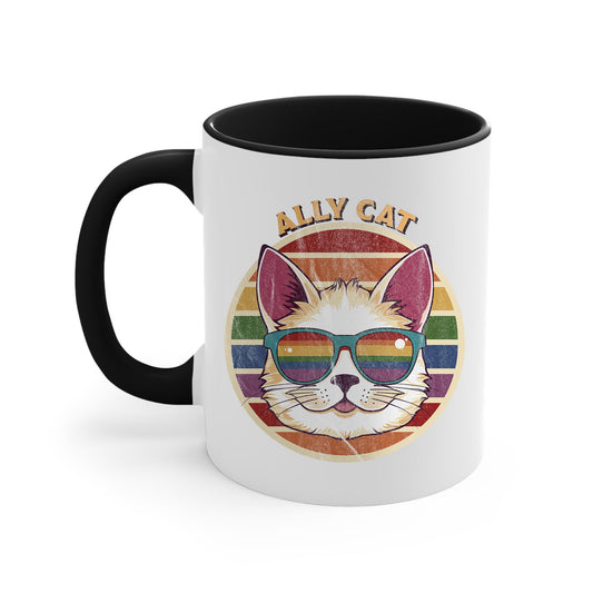 11oz ceramic mug with a black handle and interior with a circular retro-inspired image of a cat wearing rainbow sunglasses with a retro sunset made from parallel lines behind it. The text reads “ALLY CAT” in all caps, arched over the image. The graphic has a retro, worn texture.