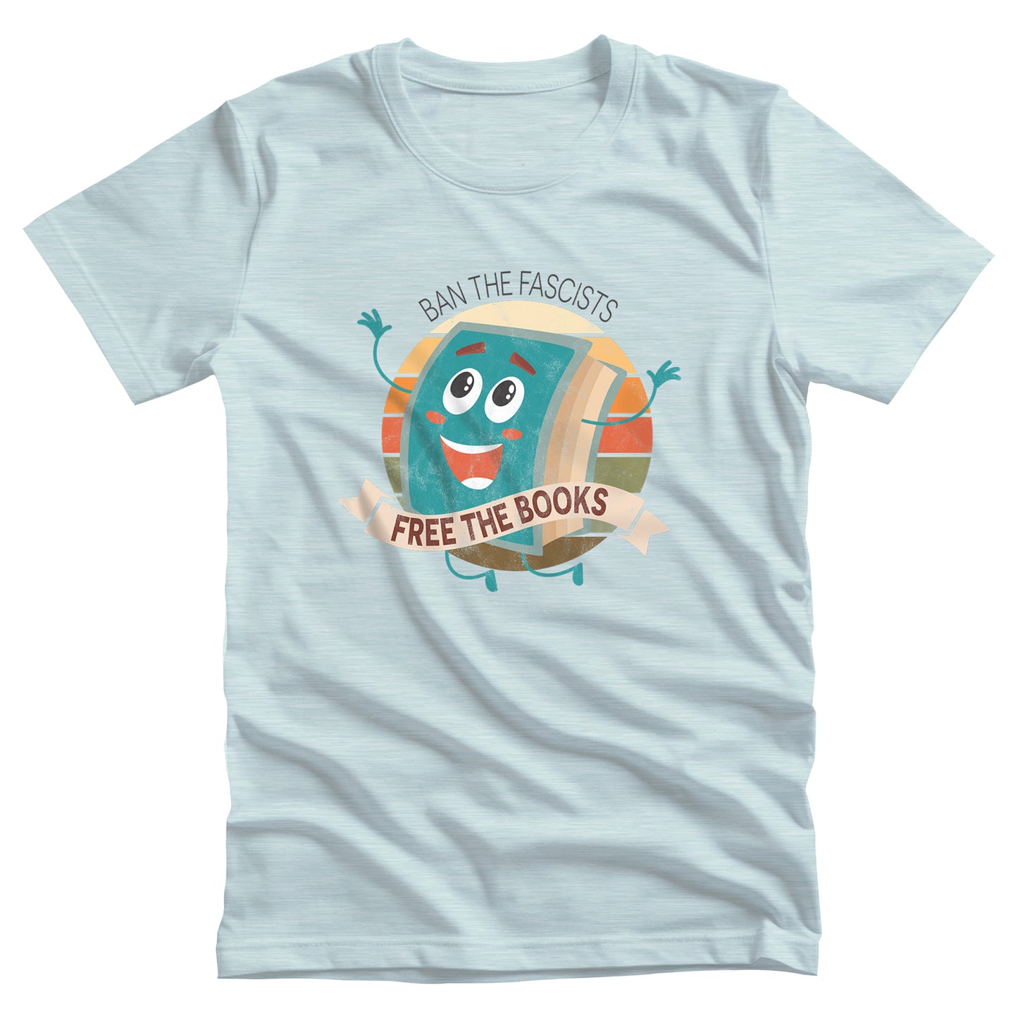 Heather Ice Blue color unisex t-shirt with a graphic that says “Ban the Fascists, Free the Books” with a vintage illustration of a cartoon book leaping for joy. There is a circle of vintage-colored stripes behind it.