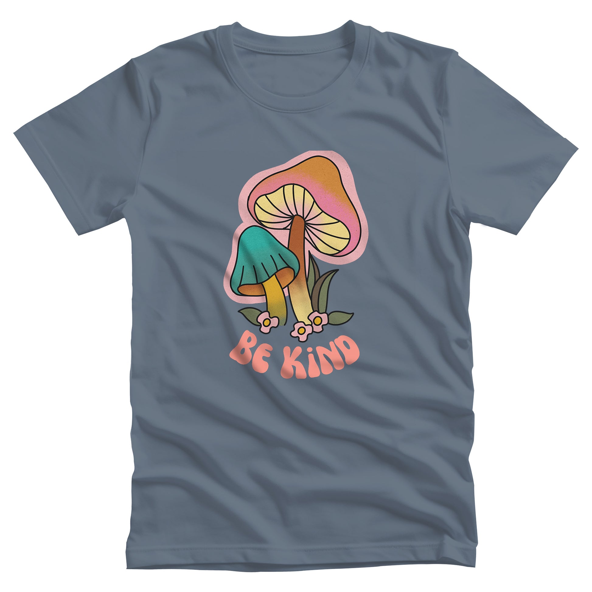 Steel Blue color unisex t-shirt that says “Be Kind” in a retro font with two retro mushrooms above the text. The text is slightly arched down.