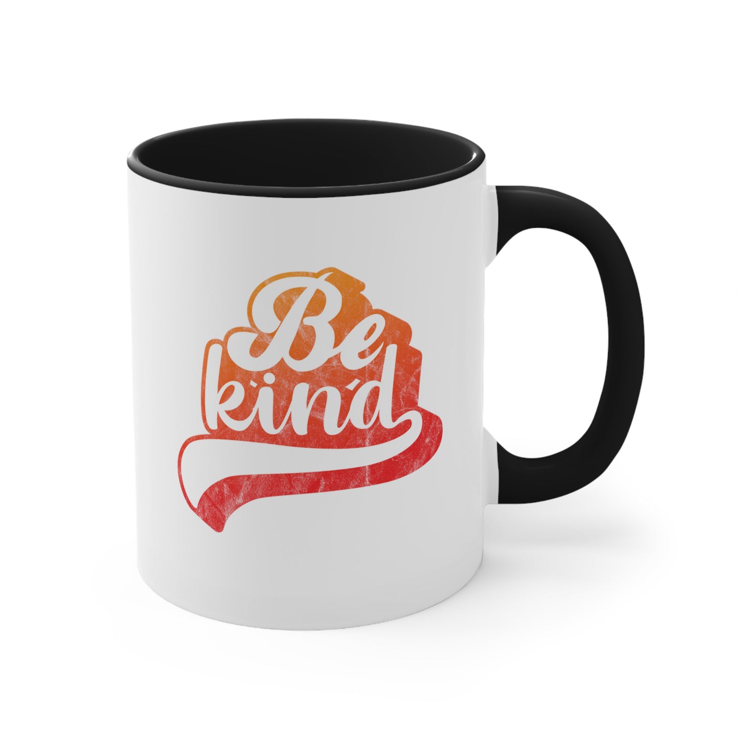 11oz ceramic mug with a black handle and interior that says, “Be Kind” in a script font that is an orange gradient color. The “d” has a unique swoosh glyph extending below the word, adding a dynamic and flowing aesthetic to the text.