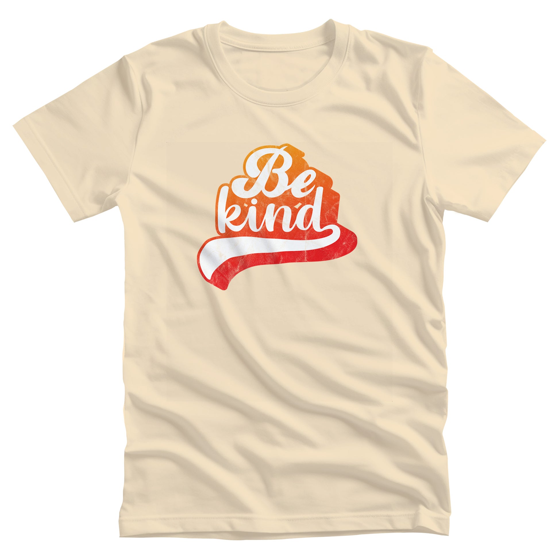 Soft Cream color unisex t-shirt that says, “Be Kind” in a script font that is an orange gradient color. The “d” has a unique swoosh glyph extending below the word, adding a dynamic and flowing aesthetic to the text.