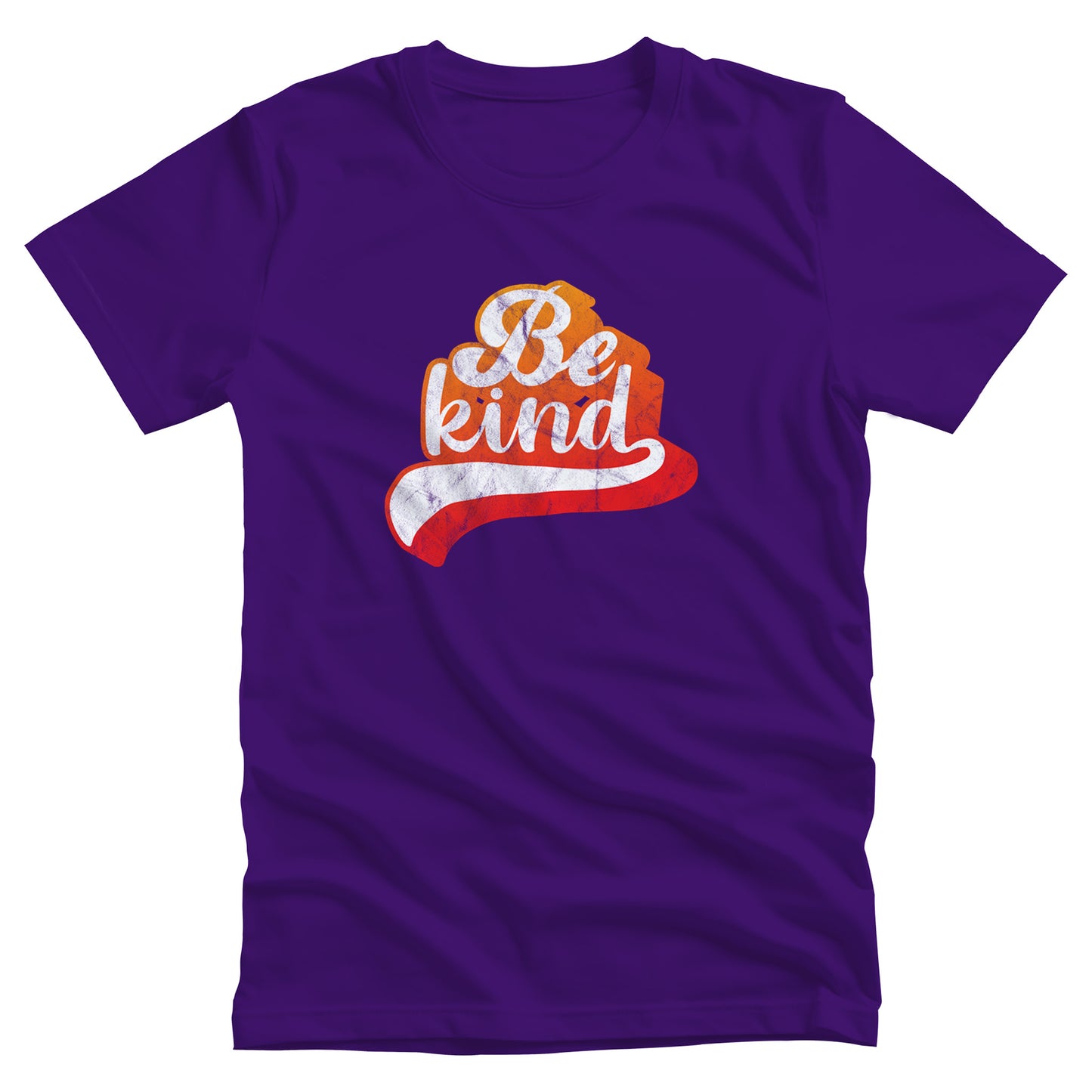 Team Purple color unisex t-shirt that says, “Be Kind” in a script font that is an orange gradient color. The “d” has a unique swoosh glyph extending below the word, adding a dynamic and flowing aesthetic to the text.