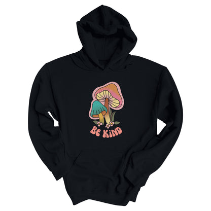 Black hoodie that says “Be Kind” in a retro font with two retro mushrooms above the text. The text is slightly arched down.