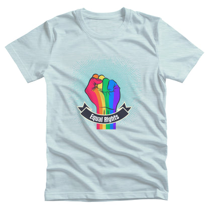 Heather Ice Blue color unisex t-shirt with a blue-green starburst and a rainbow fist in front of it. In a ribbon on the bottom of the fist over the wrist area, it says, “Equal Rights.”