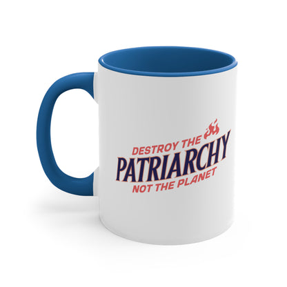 11oz ceramic mug with a blue interior and handle with text: 'DESTROY THE PATRIARCHY NOT THE PLANET slanted upwards. 'DESTROY THE' is on the first line with small flames after it, 'PATRIARCHY' is on the second line, and 'NOT THE PLANET' is on the third line.