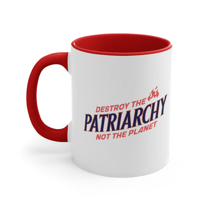 11oz ceramic mug with a red interior and handle with text: 'DESTROY THE PATRIARCHY NOT THE PLANET slanted upwards. 'DESTROY THE' is on the first line with small flames after it, 'PATRIARCHY' is on the second line, and 'NOT THE PLANET' is on the third line.