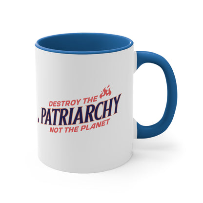 11oz ceramic mug with a blue interior and handle with text: 'DESTROY THE PATRIARCHY NOT THE PLANET slanted upwards. 'DESTROY THE' is on the first line with small flames after it, 'PATRIARCHY' is on the second line, and 'NOT THE PLANET' is on the third line.