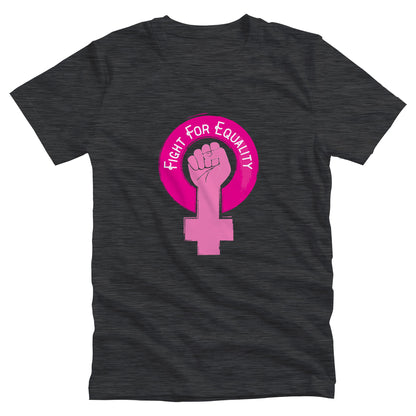 Dark Grey Heather color unisex t-shirt that says, “Fight for Equality” arched inside a pink gender symbol for women. The “T” in the symbol is in the shape of a fist.