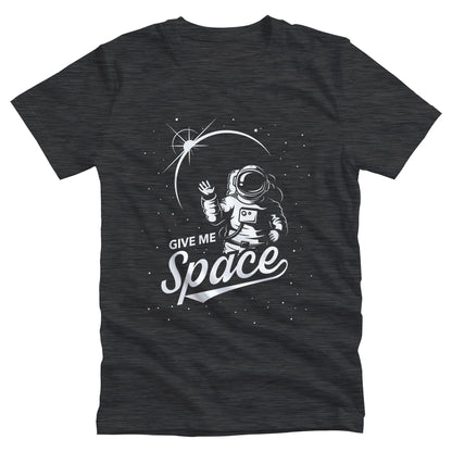 Dark Grey Heather color unisex t-shirt that says, “Give me Space” in a retro font. The text is slightly sheared upwards with an illustration of an astronaut and the mood integrated in on the right side.