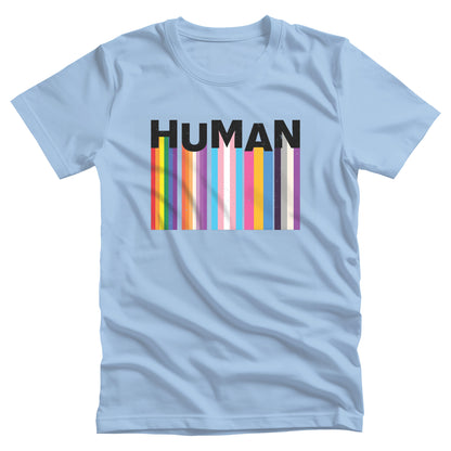 Baby Blue color unisex t-shirt with a colorful and dynamic image featuring the word "HUMAN" written in an artistic style. Each letter is arranged to create a wavy pattern. There are stripes of colors coming down from the bottom of each letter representing different sexualities in the LGBTQ+ community. The "H" represents Gay, the "U" represents Lesbian, the "M" represents Trans, the "A" represents Pansexual, and the "N" represents Asexual.