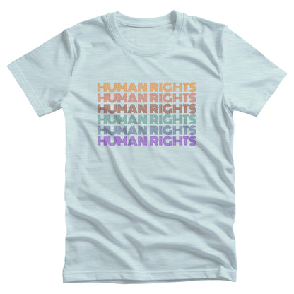 Heather Ice Blue color unisex t-shirt that says, “HUMAN RIGHTS” six times. The first row is yellow, the second row is burgundy/red, the third row is dark maroon, the fourth row is teal, the fifth row is dark blue, and the last row is purple.