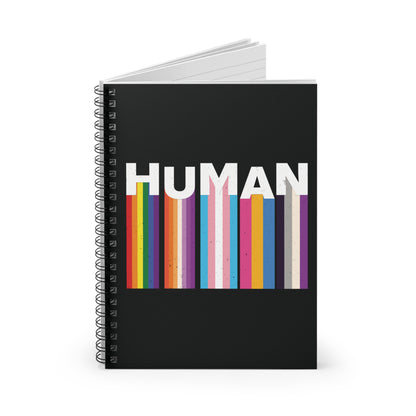 A 118-page spiral bound notebook with a black cover. It has a colorful and dynamic image featuring the word "HUMAN" written in an artistic style.  Each letter is arranged to create a wavy pattern. There are stripes of colors coming down from the bottom of each letter representing different sexualities in the LGBTQ+ community. The "H" represents Gay, the "U" represents Lesbian, the "M" represents Trans, the "A" represents Pansexual, and the "N" represents Asexual.