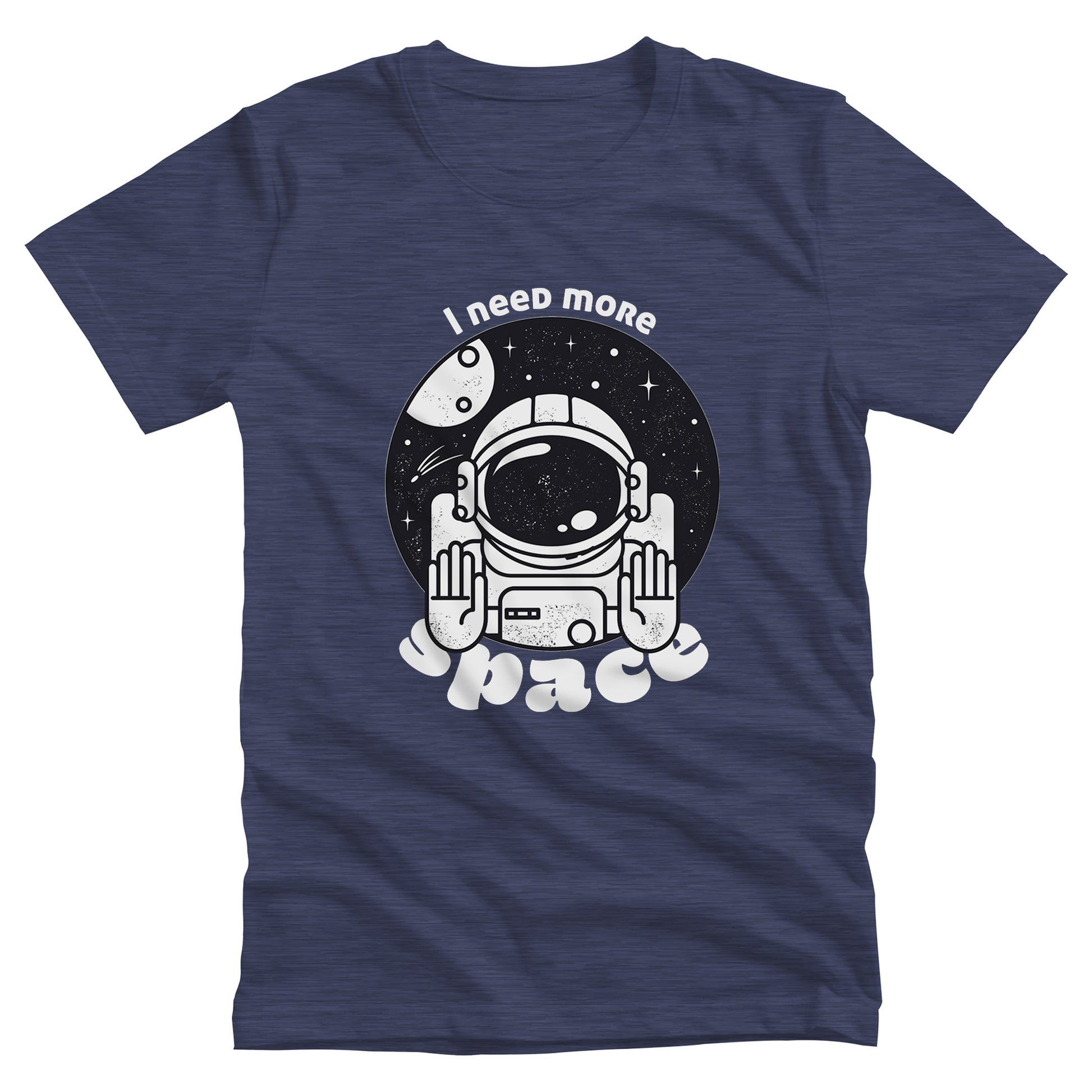 Heather Navy color unisex t-shirt that says, “I need more space”. The text is a retro font. There is a graphic of an astronaut inside a circle with their hands in the stop position. “I need more” is arched over the graphic, and “space” is reverse-arched over the bottom of the graphic.