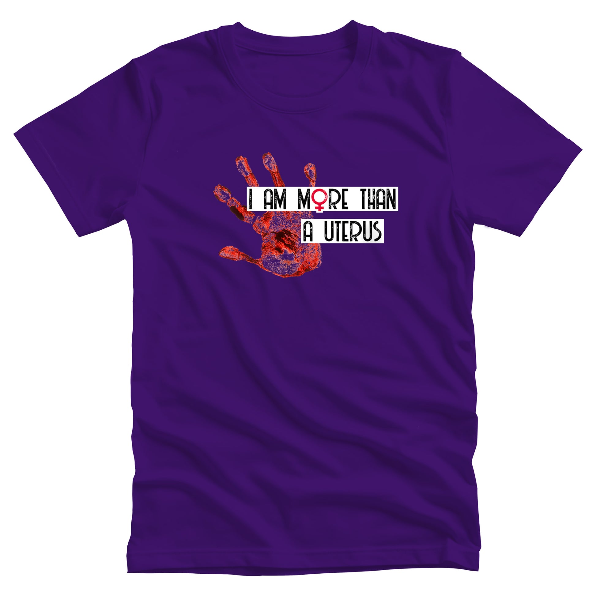 Team Purple color unisex t-shirt that says, “I Am More Than a Uterus” in all caps. “I Am More Than” is on one line and “a Uterus” is on a separate line. The text all has a thin white rectangle behind it that expands the length of the text. To the left is a red handprint.