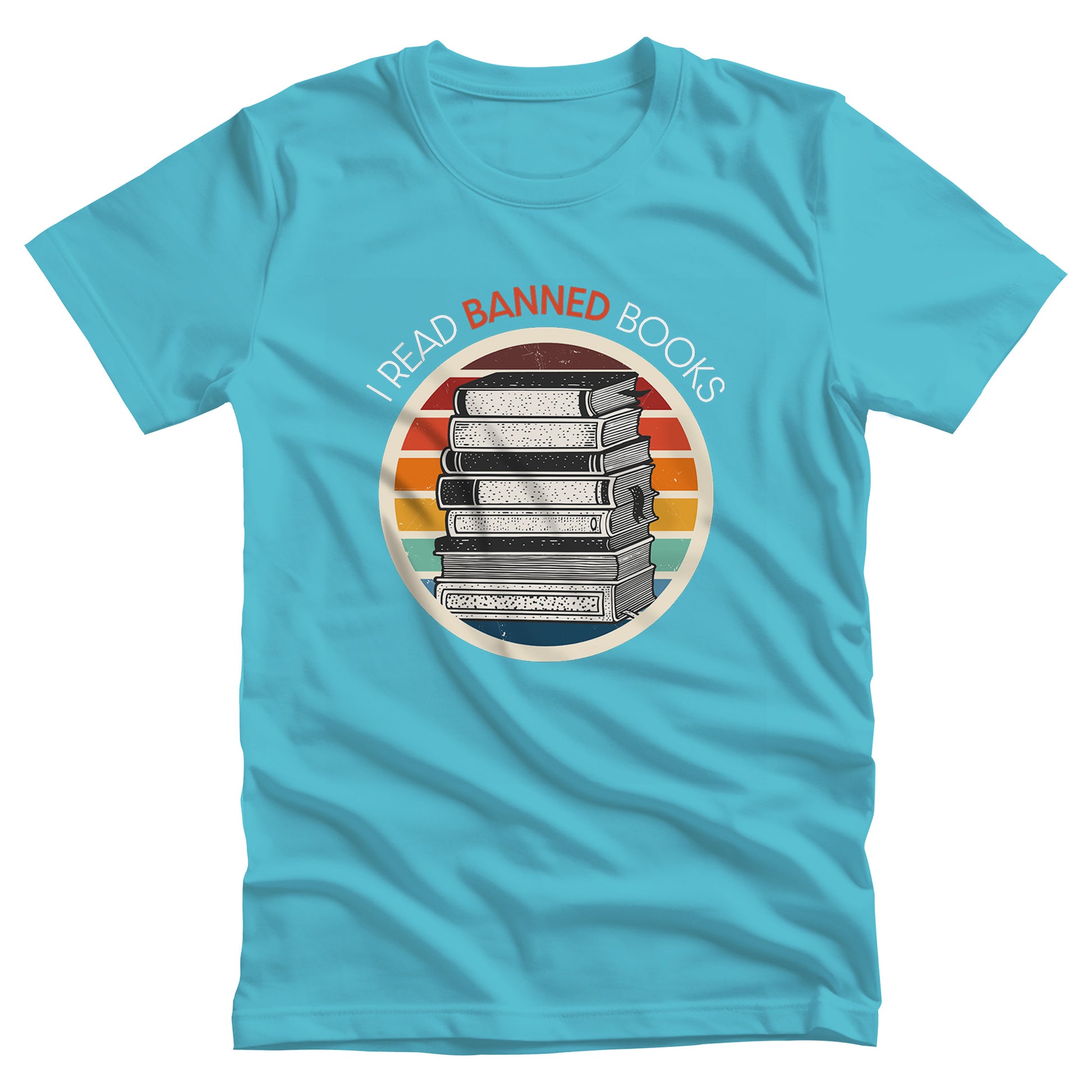 Turquoise unisex t-shirt with a circular graphic of stacked old books with a vintage sunset made from horizontal lines behind it. “I READ BANNED BOOKS” is arched over the graphic with the word. “BANNED” an orange color.