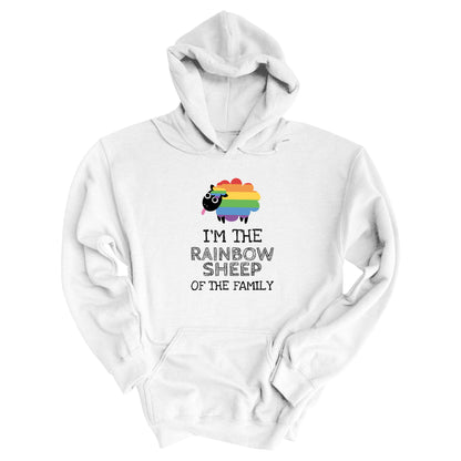 White hoodie that says, “I’m the rainbow sheep of the family” with a graphic of a rainbow-colored sheep above it.
