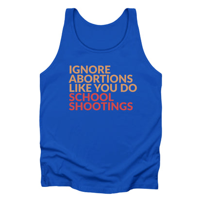 True Royal tank top that says “Ignore abortions like you do school shootings” in all caps in an orange font. The words “school shootings” are in red.