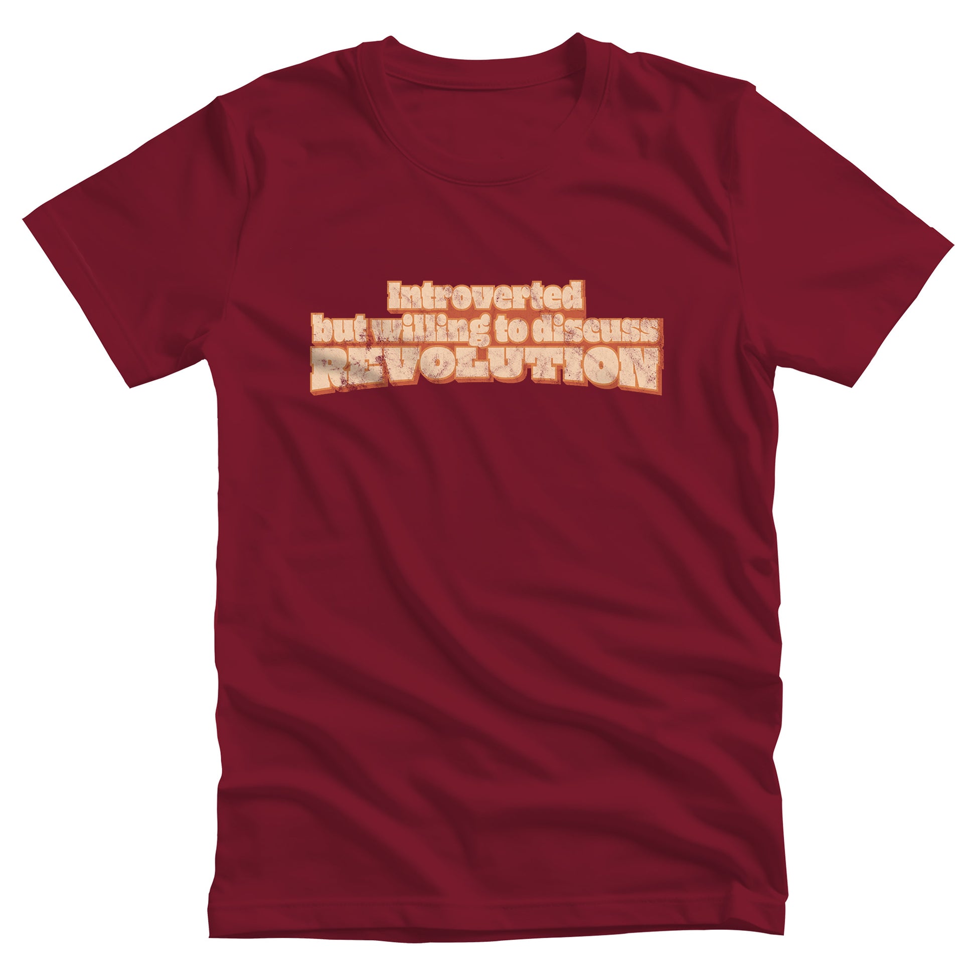 Cardinal color unisex t-shirt that says “Introverted but willing to discuss revolution.” The text is retro-inspired and has a distressed look.