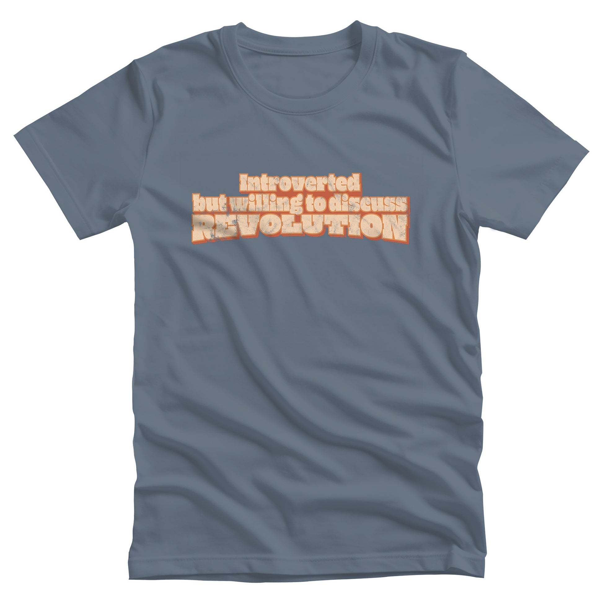 Steel Blue color unisex t-shirt that says “Introverted but willing to discuss revolution.” The text is retro-inspired and has a distressed look.