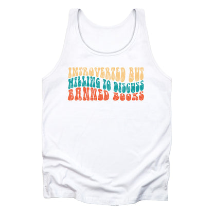 White unisex tank top with a graphic that says “Introverted but willing to discuss banned books” in a retro, 1970s bubble font. Each line is a different color. The graphic is slightly distressed.