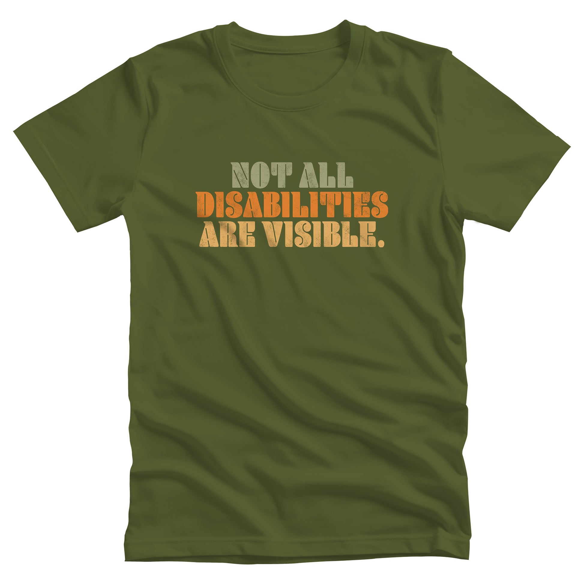 Olive color unisex t-shirt that says, “Not all disabilities are visible” in a thick, retro font in all caps. Each line is a different color. “Not all” is light green, “disabilities” is orange, and “are visible” is yellow. The graphic has a retro look and is slightly distressed.