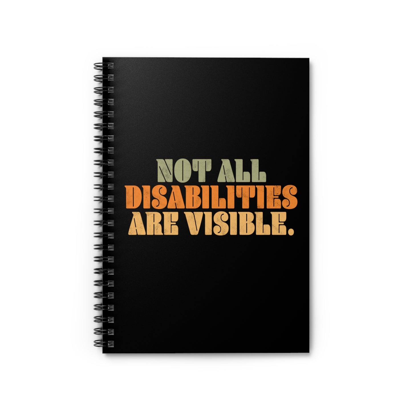 A black spiral notebook that says, “Not all disabilities are visible” in a thick, retro font in all caps. Each line is a different color. “Not all” is light green, “disabilities” is orange, and “are visible” is yellow. The graphic has a retro look and is slightly distressed. The mug is on a table with a spoon and a cookie.