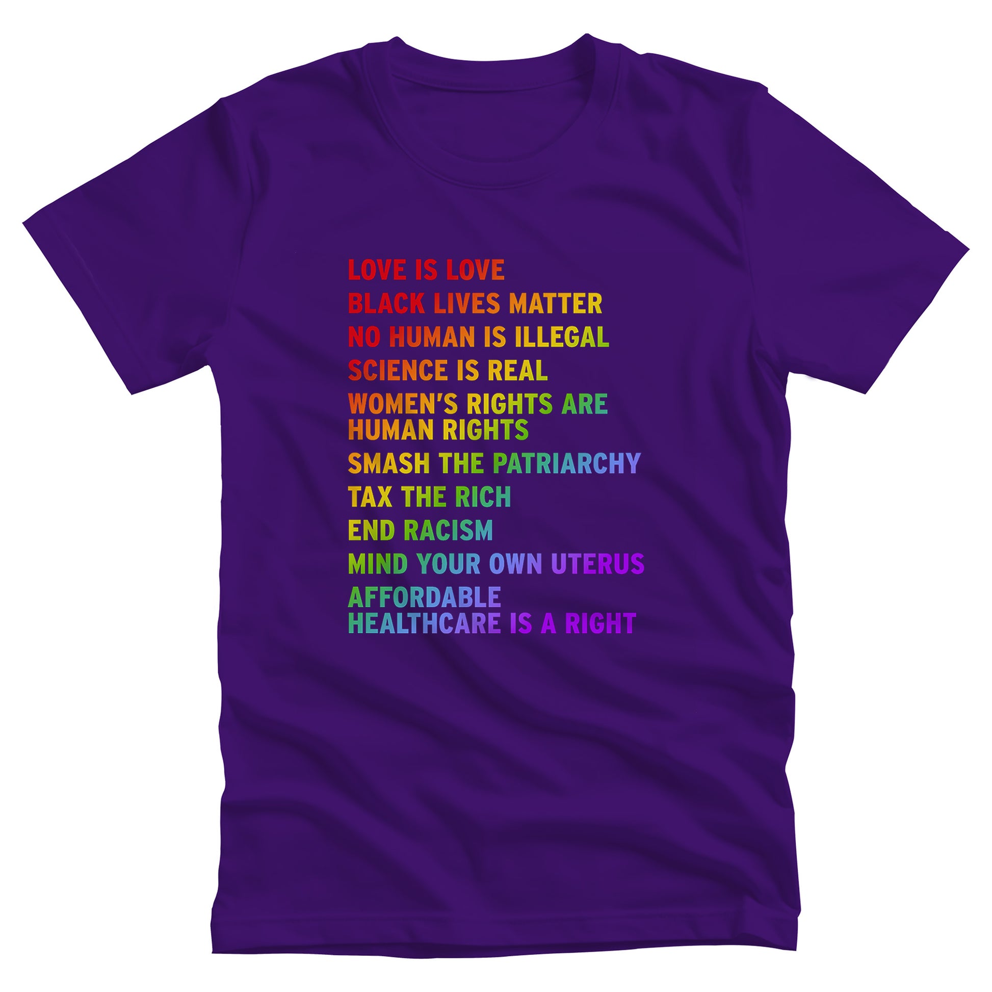 Team Purple color unisex T-shirt with rainbow-colored text that says: Love is Love, Black Lives matter, No Human is Illegal, Science is Real, Women's Rights are Human Rights, Smash the Patriarchy, Tax the Rich, End Racism, Mind Your Own Uterus, Affordable Healthcare is a Right