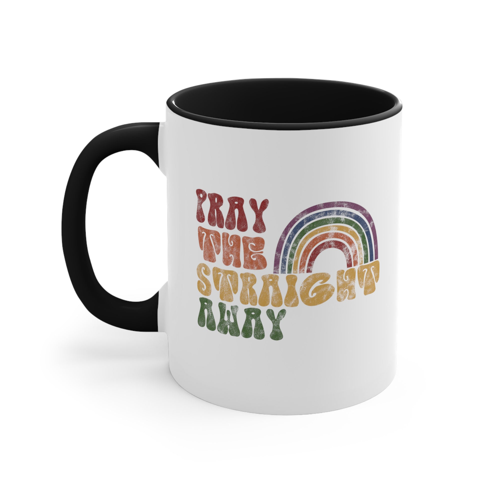 11oz ceramic mug with a black interior and handle that says, “PRAY THE STRAIGHT AWAY” in a retro font. Each word is a different retro color and on its own line. “PRAY” is maroon, “THE” is orange, “STRAIGHT” is yellow, and “AWAY” is green. The words are stacked and left-aligned with a rainbow graphic that has matching colors nestled after the word “THE” over the word “STRAIGHT.”