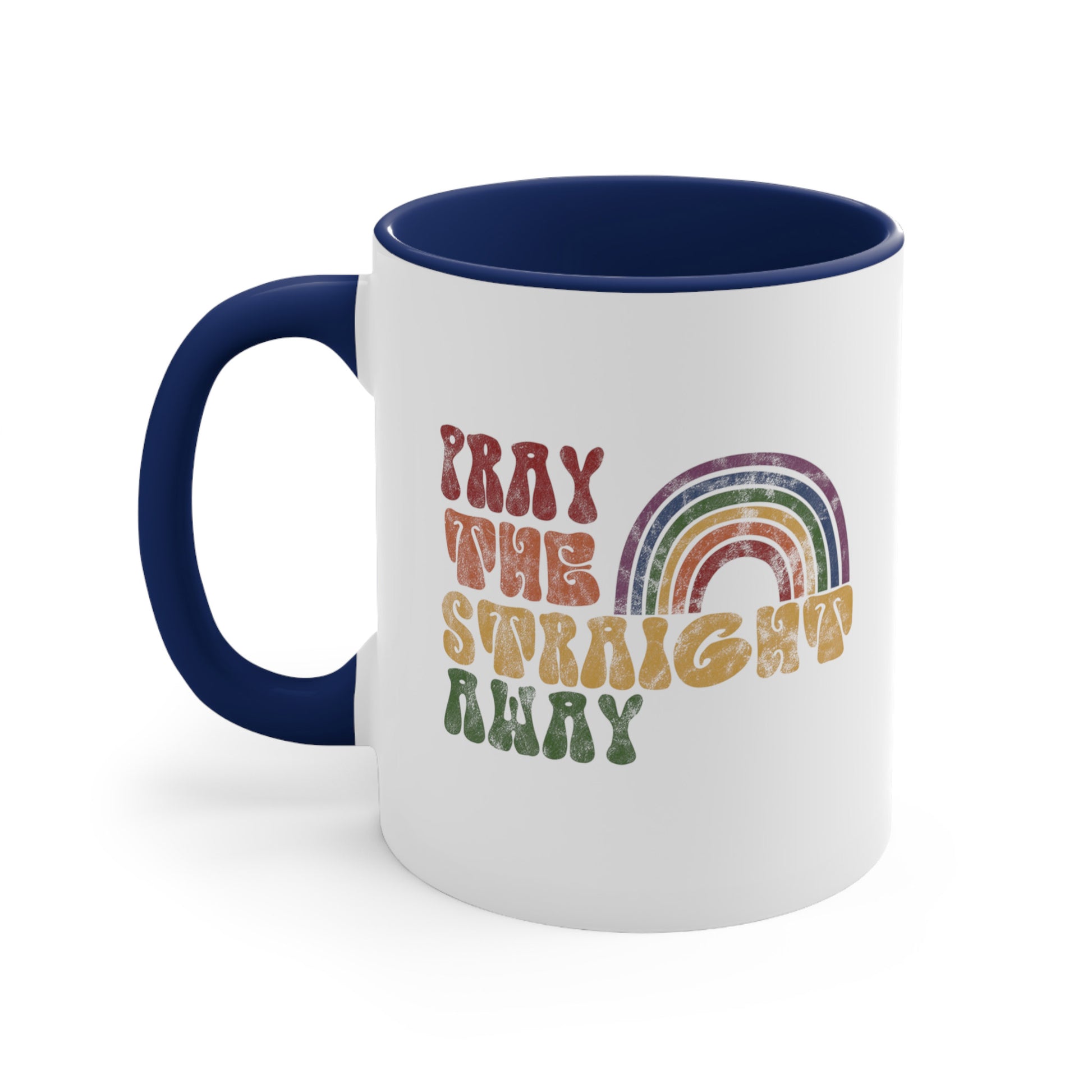 11oz ceramic mug with a navy blue interior and handle that says, “PRAY THE STRAIGHT AWAY” in a retro font. Each word is a different retro color and on its own line. “PRAY” is maroon, “THE” is orange, “STRAIGHT” is yellow, and “AWAY” is green. The words are stacked and left-aligned with a rainbow graphic that has matching colors nestled after the word “THE” over the word “STRAIGHT.”