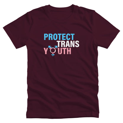 Maroon unisex t-shirt that says, “Protect Trans Youth” in all caps. Each word is on its own line. Each line correlates to the trans flag colors. The  “O” in the word “Youth” is the trans symbol.