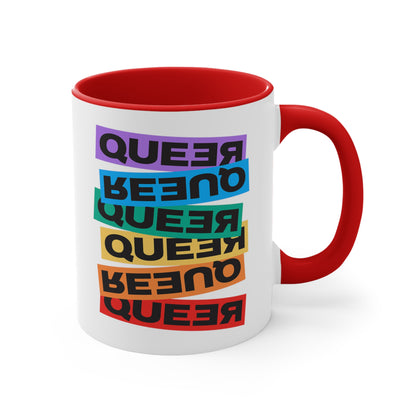 11oz ceramic mug with a red handle and interior. This mug artistically expresses the word “Queer.” Each variation of the word is black text in a rectangular block and stacked vertically at a slightly different angle than the next row/block. Sometimes “Queer” is backward, sometimes upside down, and sometimes 1-2 letters are backward. The color blocks are purple, blue, green, yellow, and red.