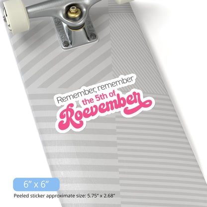 Contextual image of a 6x6 inch (5.75x2.68 inches peeled) indoor sticker featuring the phrase 'Remember, Remember the 5th of Roevember'. The text 'The 5th of Roevember' is highlighted in pink, embellished with a decorative script font and additional swooshes. The sticker is on a skateboard.