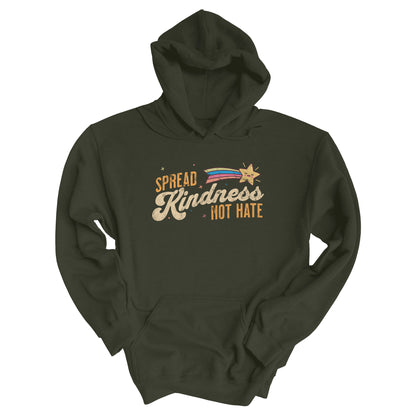 Military Green unisex hoodie with a graphic that says “Spread Kindness Not Hate” with an illustration of a rainbow shooting star over the word “kindness.” That word is in a script font, and the rest is a regular font in all caps. ”Spread” is on top of the word “Kindness” and aligned left, while “Not Hate” is below the word “kindness” and aligned to the right.