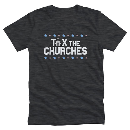 Dark Grey Heather color unisex t-shirt featuring bold text that reads 'TAX THE CHURCHES,' with the letter 'A' in 'TAX' depicted as a church illustration. Alternating blue and pink stars decorate the phrase above and below.