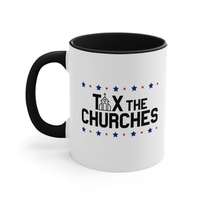 11oz ceramic mug with a black interior and handle featuring bold text that reads 'TAX THE CHURCHES,' with the letter 'A' in 'TAX' depicted as a church illustration. Alternating blue and red stars decorate the phrase above and below.