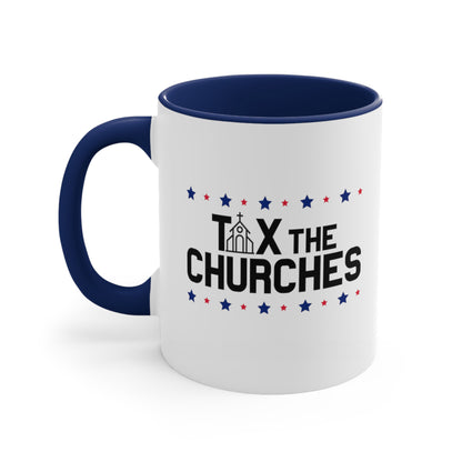 11oz ceramic mug with a navy interior and handle featuring bold text that reads 'TAX THE CHURCHES,' with the letter 'A' in 'TAX' depicted as a church illustration. Alternating blue and red stars decorate the phrase above and below.