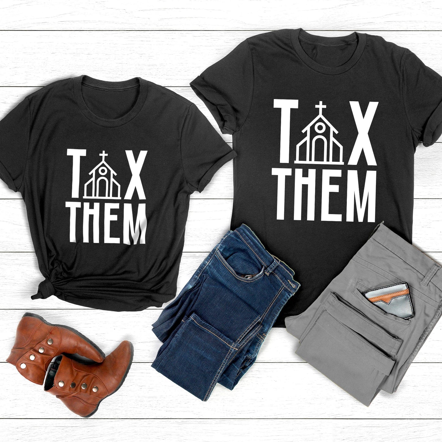 Dark Grey Heather color unisex t-shirt that says, “TAX THEM.” The “A” in “TAX” is a line illustration of a church.