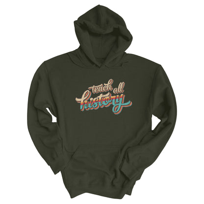Military Green color unisex hoodie that says, “Teach all history" in retro colors and a script font. The text is slightly angled upwards, with the word "history" being larger than "teach all".