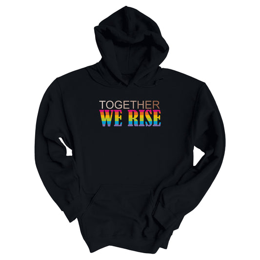 Black unisex hoodie with a graphic that says “Together We Rise”. The word “Together” is a skin-colored gradient that spans from light to dark. “We Rise” is in all caps and horizontal rainbow stripes.