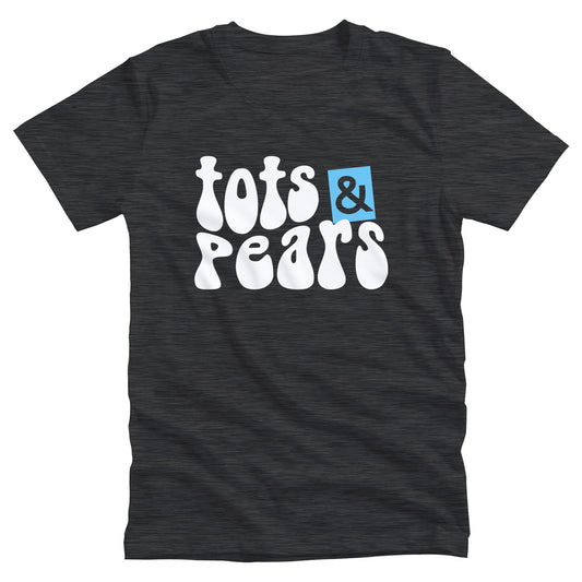 Dark Grey Heather color unisex t-shirt that says, “tots & pears” in a retro font in a mild wave form. The ampersand is cut out from a blue box that is slightly askew.